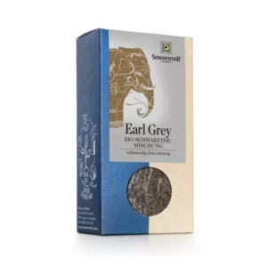 Sonnentor Tee Earl Grey-Box mit Elefantenmotiv und einem Fenster, durch das der lose Tee im Inneren sichtbar wird.