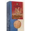 Eine Schachtel SONNENTOR LEBKUCHEN GEWÜRZ im Lebkuchendesign mit Fenster, durch das die Gewürzmischung im Inneren preisgegeben wird.