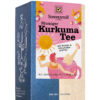 Eine Packung SONNENTOR BLUMIGER KURKUMA TEE, verfeinert mit Rosen und Holunderblüten, präsentiert sich im rosa-blauen Design mit einer Teegenuss-Illustration.