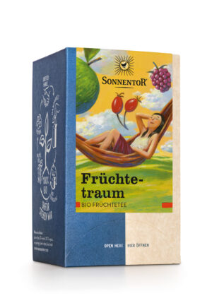 Eine Schachtel SONNENTOR FRÜCHTETRAUM TEE, auf der Vorderseite ist eine Frau zu sehen, die in einer Hängematte entspannt.