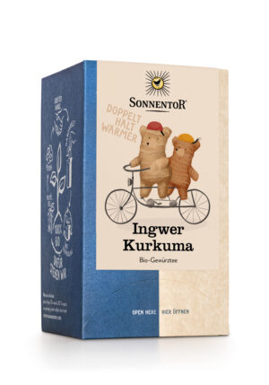 Die Schachtel von SONNENTOR TEE INGWER KURKUMA zeigt ein Design mit zwei Ingwer- und Kurkuma-Maskottchen, die Fahrrad fahren.