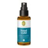 Bernsteinfarbene Flasche PRIMAVERA HANDWOHL HYGIENEPFLEGESPRAY mit schwarzem Sprühverschluss und blauem Etikett.