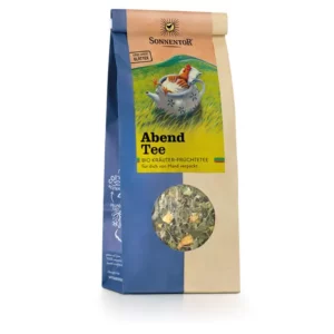 Eine Packung SONNENTOR ABEND TEE Kräuter-Früchtetee mit einem runden Fenster, durch das die Teeblätter sichtbar sind und auf dem zwei Hühner und eine Sonne abgebildet sind.
