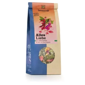 Eine SONNENTOR ALLES LIEBE TEEMISCHUNG LOSE Kräuterteemischung in farbenfroher Verpackung mit zwei illustrierten Figuren.