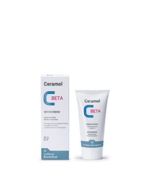 CERAMOL BETA INTIMCREME, verpackt in einer weißen Tube mit blauem und rosa Text, wird neben einer passenden Schachtel mit der Aufschrift „Unifarco Biomedical“ gezeigt, die zum Schutz und zur Pflege der Haut entwickelt wurde.