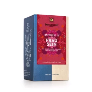 Vorderansicht einer Schachtel SONNENTOR HAPPINESS IS FRAU SEIN TEE, rote Verpackung mit Blumenmuster und deutschem Text. Der Kräuterfrüchtetee enthält Preiselbeeren, Rosmarin und Frauenmantel.