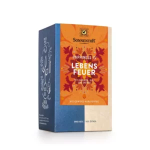 Eine Schachtel SONNENTOR TEE HAPPINESS LEBE Tee mit Kurkuma, Orange, Safran, beinhaltet ein farbenfrohes Design mit Sonnenmotiv.