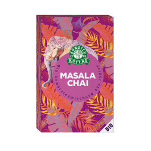 Farbenfrohe Schachtel mit „KOTTAS TEE Masala Chai“-Tee, die eine Elefantengrafik und leuchtende Blätter auf einem rosa und orangefarbenen Hintergrund zeigt. Text auf Deutsch.