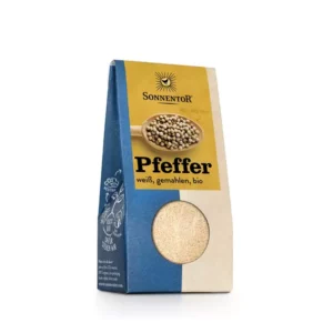 Packung mit SONNENTOR PFEFFER WEISS GEMAHLEN im blau-beigen Design mit einem kleinen runden Fenster, durch das der Inhalt sichtbar wird.
