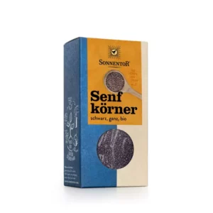 Eine Schachtel SONNENTOR SENFKÖRNER SCHWARZ Senfkörner mit der Aufschrift „Senfkörner, schwarz, ganz, bio“ und einem kleinen transparenten Fenster, in dem die Samen sichtbar sind.