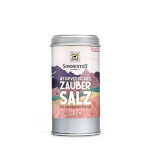 Sonnentor Ayurvedisches Zaubersalz in einer Dose aus Punjab mit der Aufschrift „SONNENTOR AYUVERDISCHES ZAUBERALZ FEIN“ und einem violetten Bergmotiv.