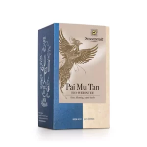 Schachtel SONNENTOR PAI MU TAN TEE Bio-Weißtee mit Phönix-Illustration und dem Text „fein, blumig, zart-herb“.