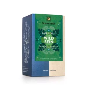 Die Verpackung des Kräutertees „Wildes Glück“ von Sonnentor präsentiert sich in einem grün-blauen Design, geschmückt mit Naturbildern und einem deutschen Text, der auf Bio-Kräutergewürze hinweist.