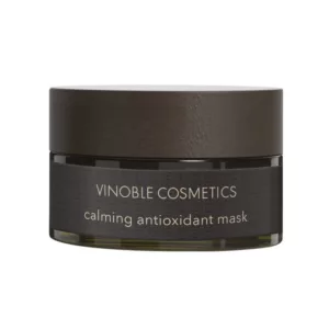 Ein Tiegel mit einer beruhigenden Antioxidans-Maske von Vinoble Cosmetics, mit dunkelbraunem Deckel und Etikett.