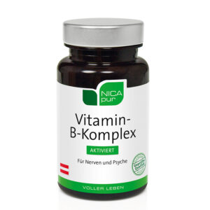 Eine dunkle Flasche mit der Aufschrift „NICAPUR KPS VIT B-KOMPL“ und silbernem Verschluss, auf dem sich ein grünes Logo und deutscher Text auf weißem Hintergrund befinden.