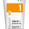 Eine weiß-orange Tube mit der Aufschrift „SCHUESS SLB NR 1 ADL“ und mehrsprachigem Text zur Hautelastizität.