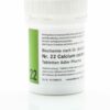 Ein weißer Behälter mit SCHUESS 22 CALC CARB D12 ADL von Adler Pharma, aufgedruckt „Nr. 22“ mit deutschem Text.