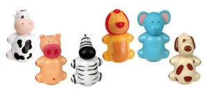 Set mit sechs MIRADENT FUNNY SNAPPERS: Zebra, Kuh, Schwein, Löwe, Elefant und Hund. Jedes Spielzeug hat ein einfaches Cartoon-ähnliches Design.