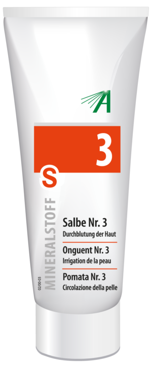 Das Produkt ist eine Tube mit der Aufschrift „SCHUESS SLB NR 3 ADL“ und mehrsprachigen Texten wie „Durchblutung der Haut“ und „Irrigation de la peau“. Es wird in einer weißen Verpackung mit roten und grauen Akzenten geliefert.