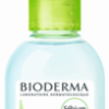 Eine Flasche BIODERMA SEB H2O REINLSG mit grünem Deckel und klarer Flüssigkeit darin.