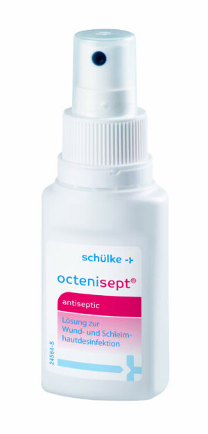 Eine weiße Flasche OCTENISEPT LSG +SPRUEHK. Antiseptisches Spray mit blauem und rosa Etikett, Sprühdüse und deutschem Text mit detaillierten Angaben zur Wund- und Schleimhautdesinfektion.
