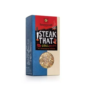 Eine Dose SONNENTOR GEWÜRZMISCHUNG STEAK, ein Bio-Grillgewürz mit getrockneten Tomaten, verfügt über ein Sichtfenster zur Anzeige der Gewürzmischung.