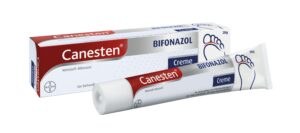 Tube und Schachtel CANESTEN BIFONAZ CR Creme, 20 g, mit Fußgrafiken zur Behandlung von Pilzinfektionen.