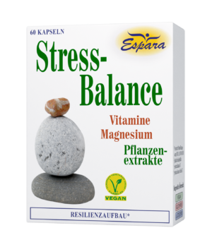 Eine Schachtel STRESS-BALANCE KPS-Kapseln mit dem Bild eines ausgewogenen Steinstapels enthält Vitamine, Magnesium und Pflanzenextrakte. Das Vegan-Zeichen und der Text „Resilienzanufbau“ sind sichtbar.