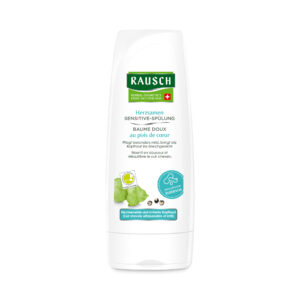Eine Flasche RAUSCH HERZSAMEN SENS SPUEL Conditioner mit grünen Akzenten und Samen- und Blattbildern, entwickelt für die Pflege empfindlicher und gereizter Kopfhaut.