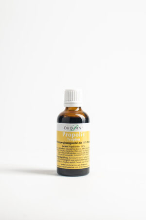 Eine braune Flasche PROPOLIS TR OEKOPAN mit weißem Verschluss und gelbem Etikett mit Produktinformationen in deutscher Sprache.