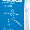 Orangefarbene Schachtel des Getränkepulvers „BASICA ABS ORIG INST ORANGE“, mit Figurengrafik und Kennzeichnung als laktosefrei und vegan.