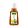 Flasche SH.RAUSCH HUFLATT.ANTISCHUPP Shampoo mit einem Etikett mit gelber Blume und grünem Logo.