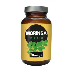 Eine braune Flasche mit der Aufschrift „Moringa Oleifera Tbl 500mg“ zeigt eine Abbildung von grünen Blättern und den Markennamen „Hanoju“.