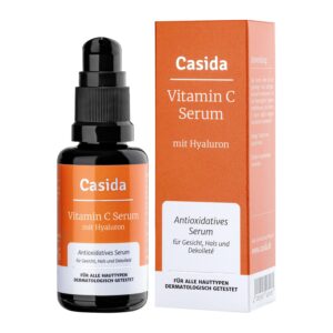 Flasche und Schachtel VIT C SER +HYALURON, für jeden Hauttyp geeignet und dermatologisch getestet.