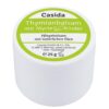 Weißes Glas mit grünem Etikett mit der Aufschrift „THYMIAN BLS +MYRTE KIND“, was auf einen Kinderpflegebalsam mit natürlichen Ölen hinweist. Inhalt: 25 g.
