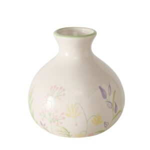 Runde, weiße Keramikvase mit schmalem Hals, hellgrünem Rand und pastellfarbenen Blumenmustern in Gelb, Lila und Rosa.