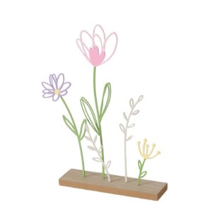 Ein dekoratives Stück mit pastellfarbenen Drahtblumen mit grünen Stängeln auf einem rechteckigen Holzsockel.